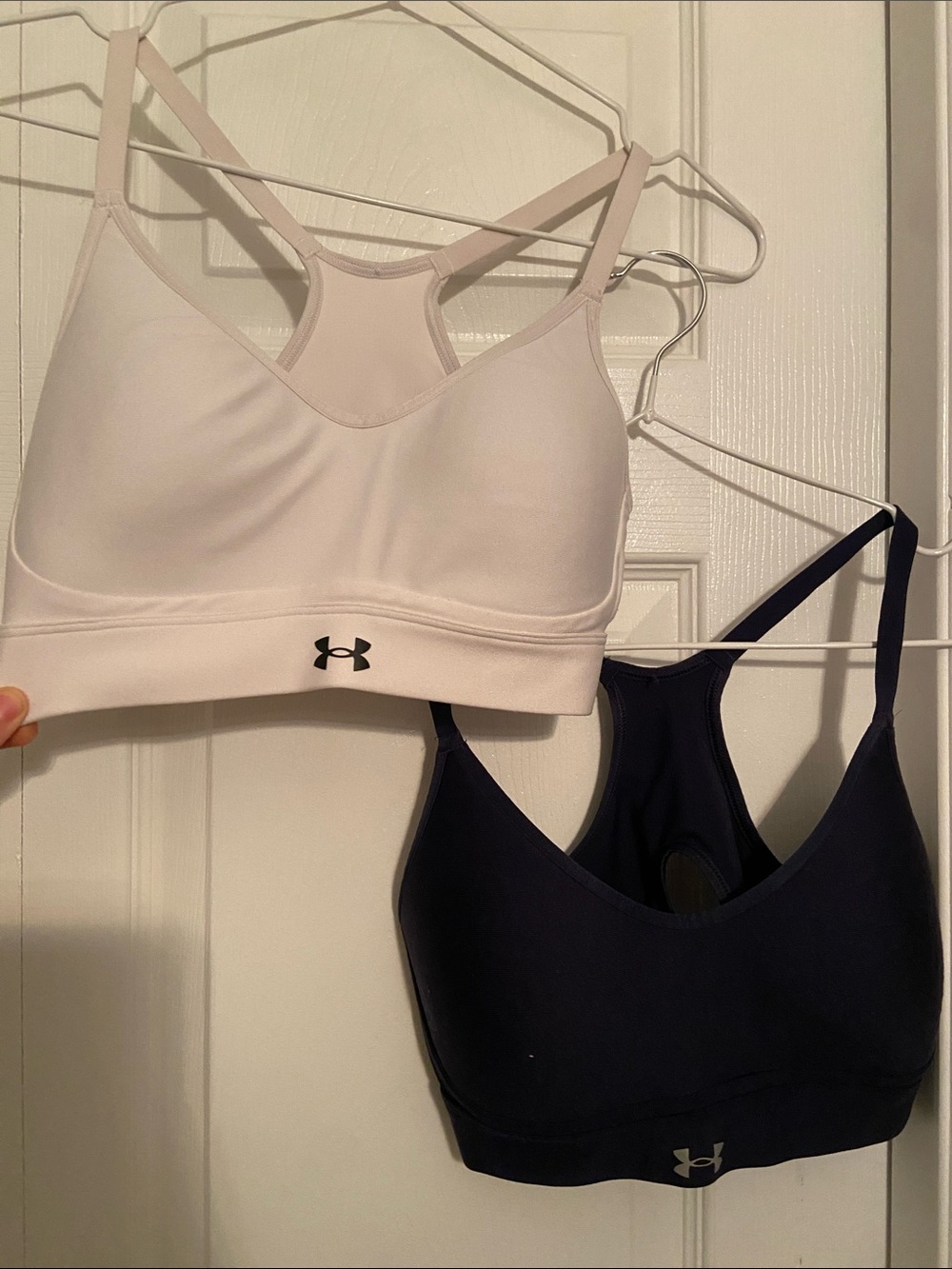 Under Armour Black Racerback Low-Impact Sports Bra in white and navy blue bundle